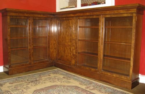 unusual large walnut corner bookcase
