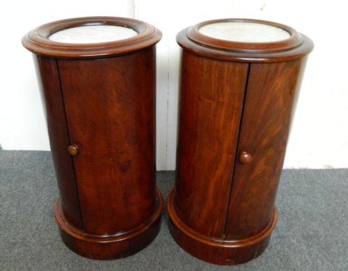 pair of cylindrical pot cupboards