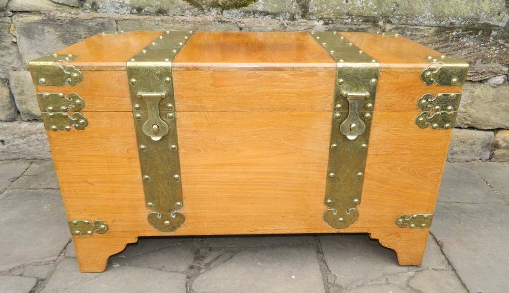 brass bound camphor wood trunk