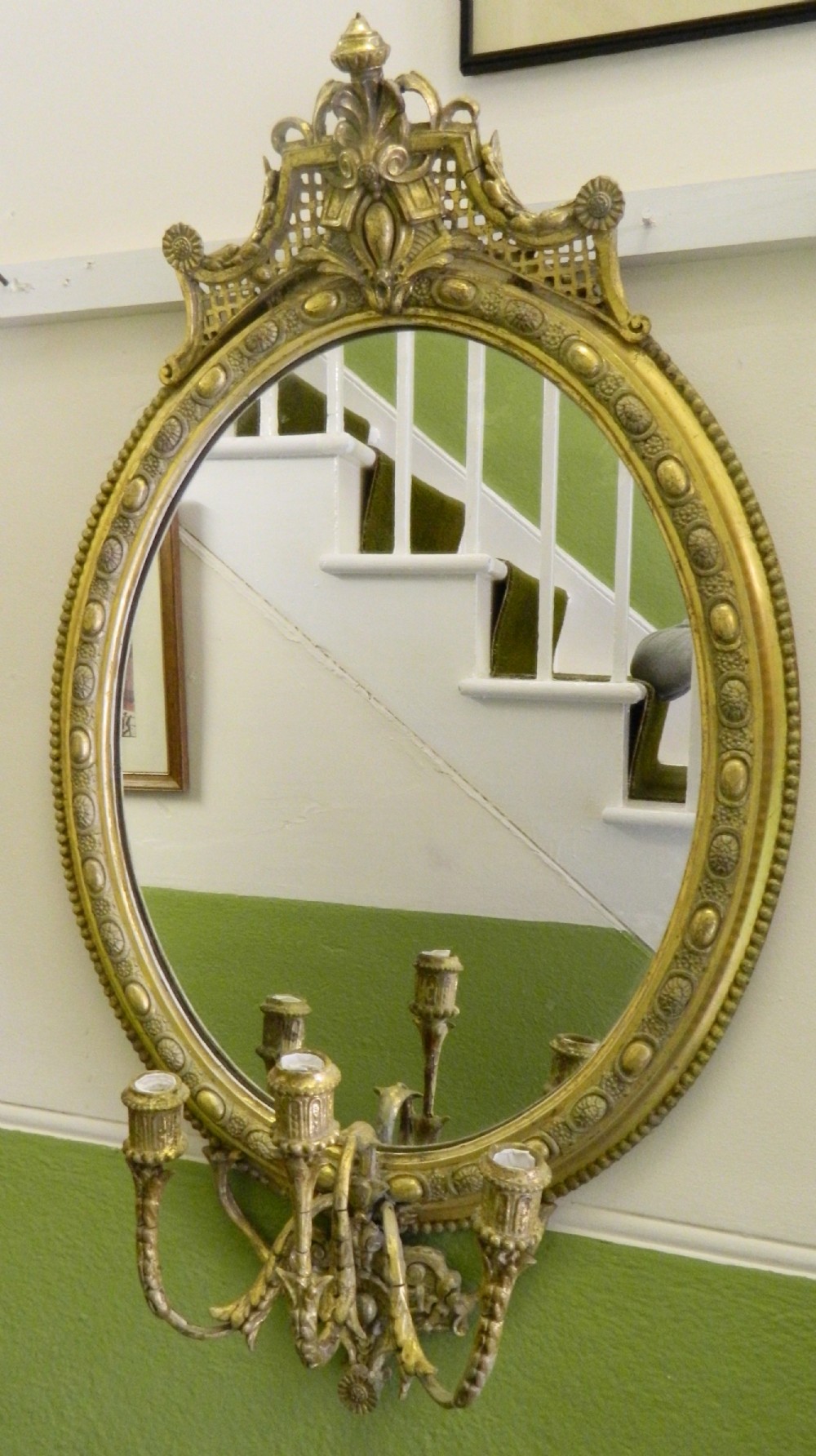 regency gilt wall mirror with candelabra