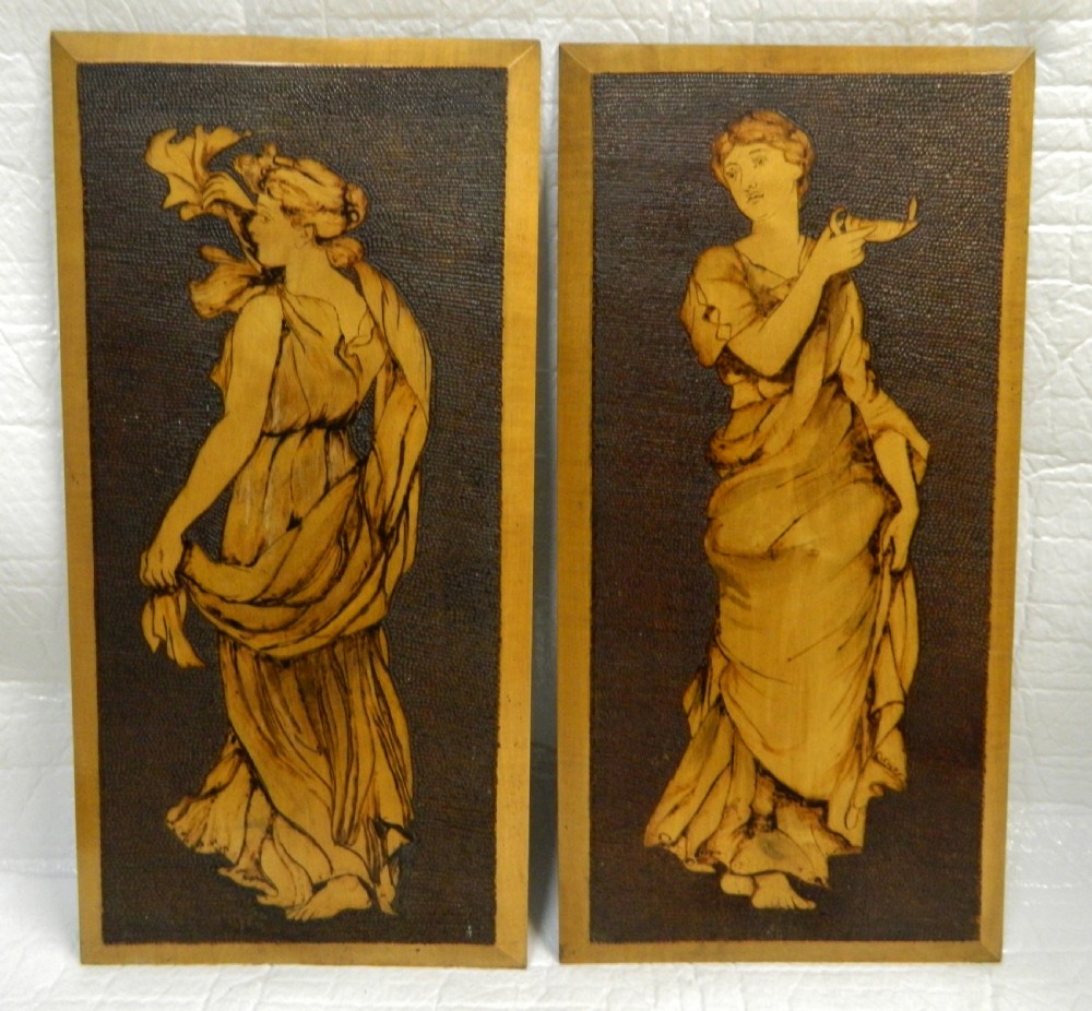 pair of arts crafts poker work wall panels