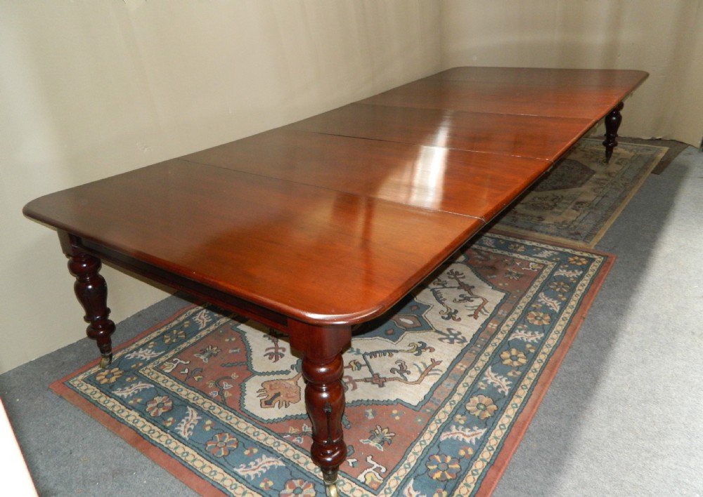 large mahogany extending dining table