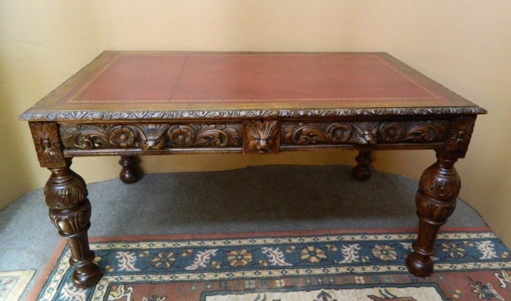large carved oak library table