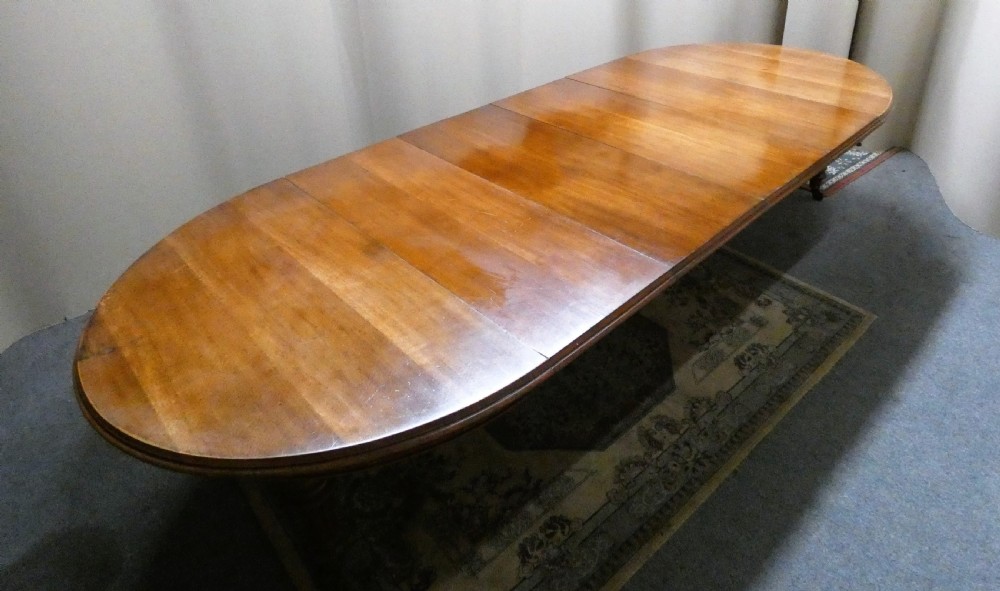 12ft extending oak dining table with 4 leaves